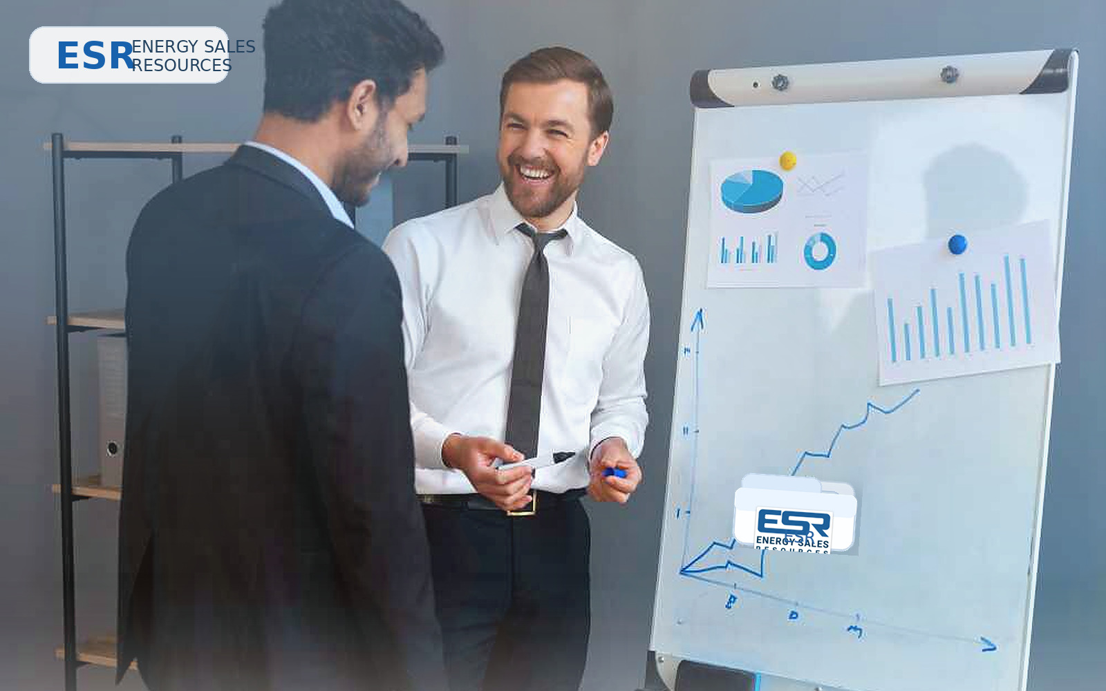 Professional client-side recruiting scene with ESR-branded folders and business planning materials